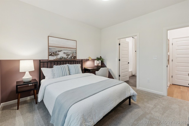 2325 E 134th Cir, Bixby, OK 74008 - bedroom featuring light carpet and baseboards