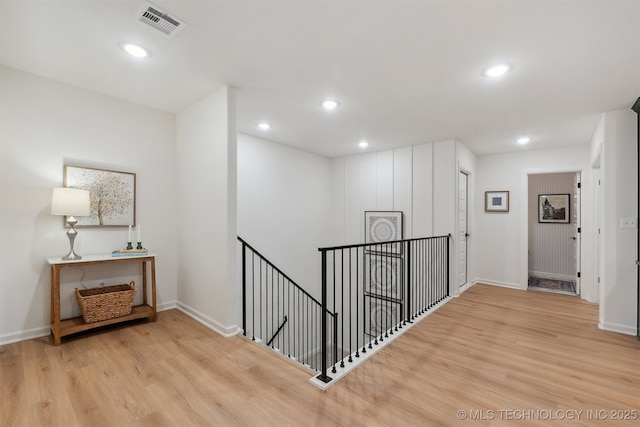 2325 E 134th Cir, Bixby, OK 74008 - corridor with an upstairs landing, wood finished floors, and recessed lighting