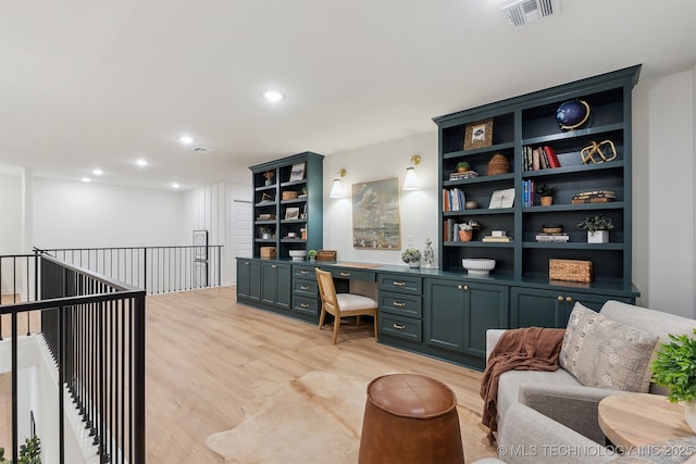 2325 E 134th Cir, Bixby, OK 74008 - office area with light wood-style flooring, built in desk, recessed lighting, and built in shelves