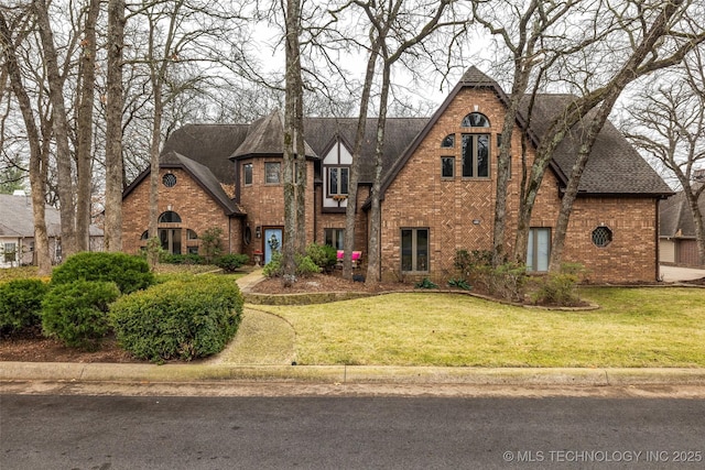 tudor house with a front yard