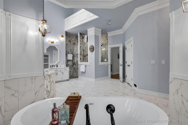 bathroom with vanity, a bathtub, crown molding, and a chandelier