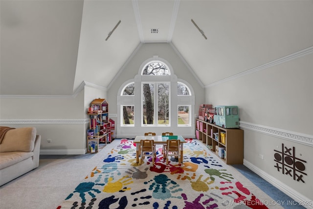 rec room featuring vaulted ceiling and carpet flooring