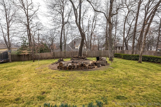 view of yard with a trampoline