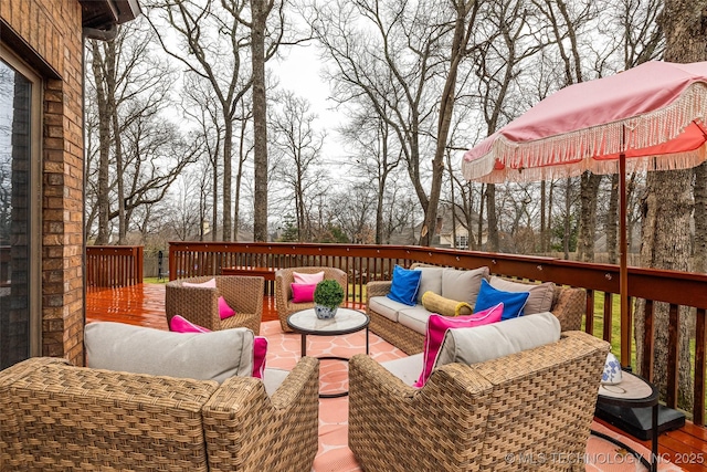 wooden deck featuring an outdoor hangout area