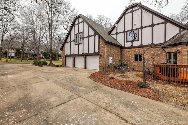 view of property exterior with a garage