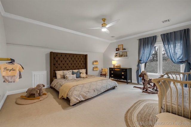 bedroom featuring ceiling fan, ornamental molding, carpet floors, and lofted ceiling