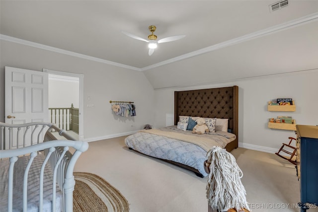 carpeted bedroom featuring ceiling fan, ornamental molding, and lofted ceiling