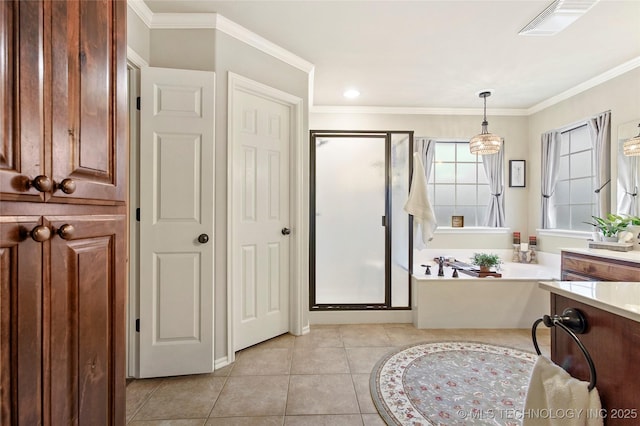 bathroom featuring tile patterned flooring, plus walk in shower, vanity, and crown molding