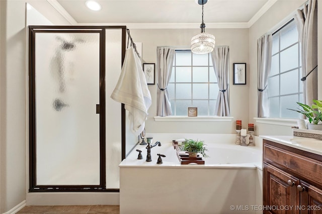 bathroom with a wealth of natural light and separate shower and tub