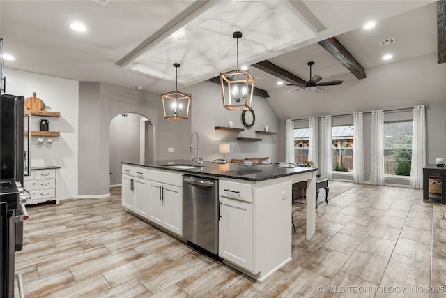 kitchen with decorative light fixtures, sink, white cabinets, stainless steel dishwasher, and a center island with sink