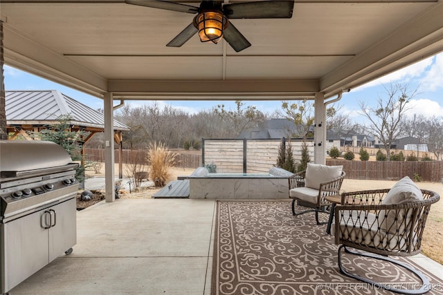 view of patio with ceiling fan