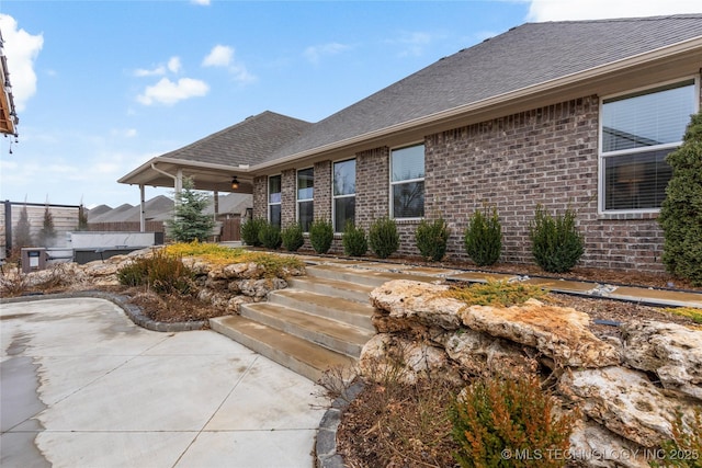 rear view of property with a patio