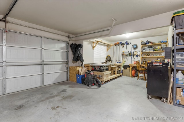 garage with a workshop area