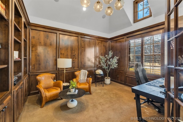 office space with light carpet, lofted ceiling, and wood walls