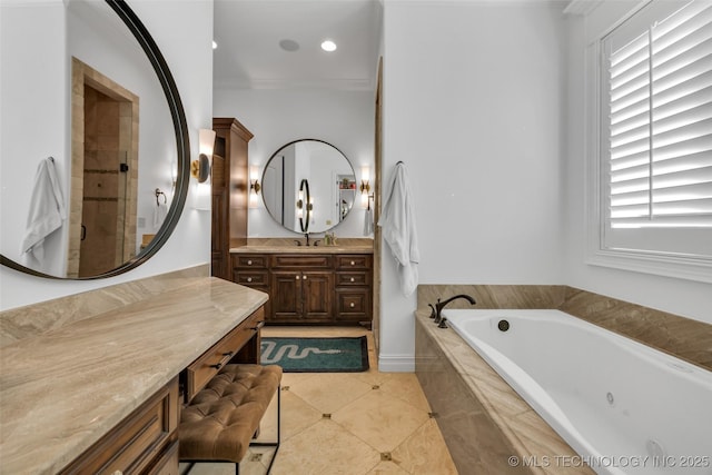 bathroom with vanity, ornamental molding, tile patterned floors, and plus walk in shower