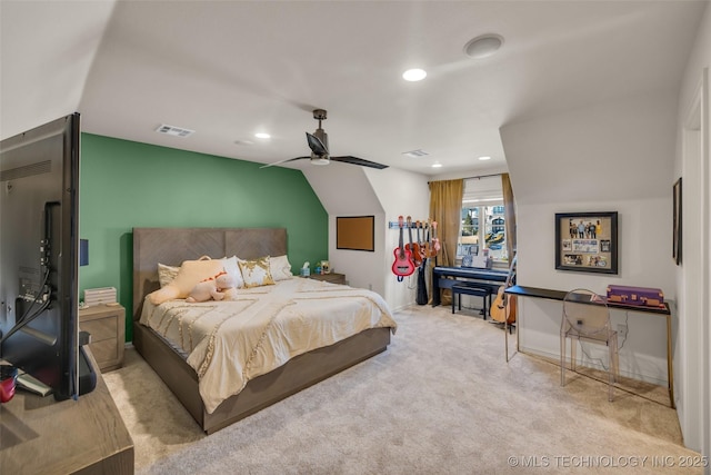 bedroom featuring ceiling fan, lofted ceiling, and light carpet