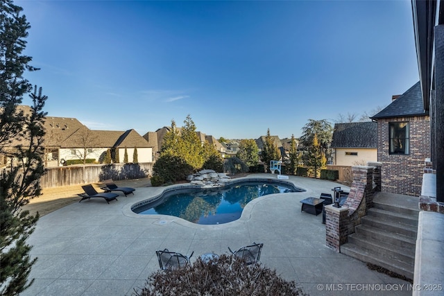 view of pool with a patio area