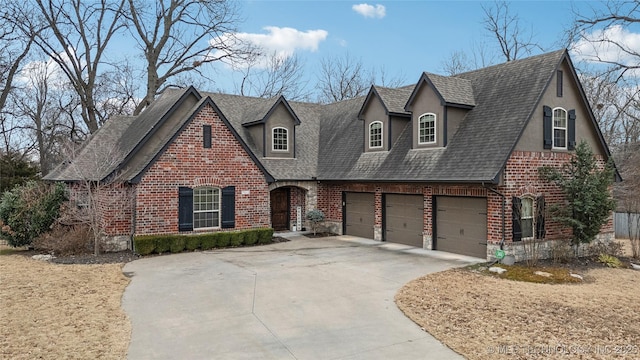 view of front of property with a garage