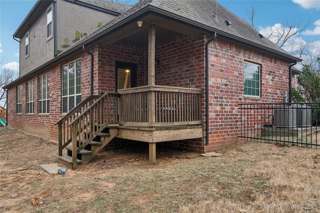 view of side of home featuring a deck