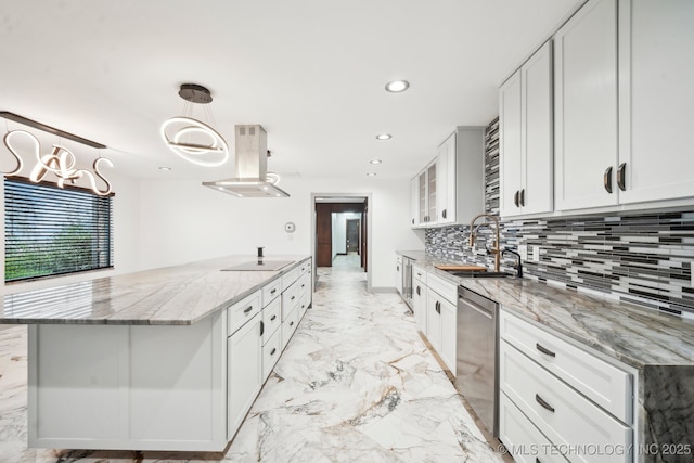 kitchen with light stone counters, island range hood, hanging light fixtures, dishwasher, and white cabinets