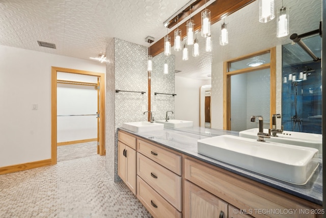 6642 E 60th Pl, Tulsa, OK 74145 - bathroom with double vanity and a shower