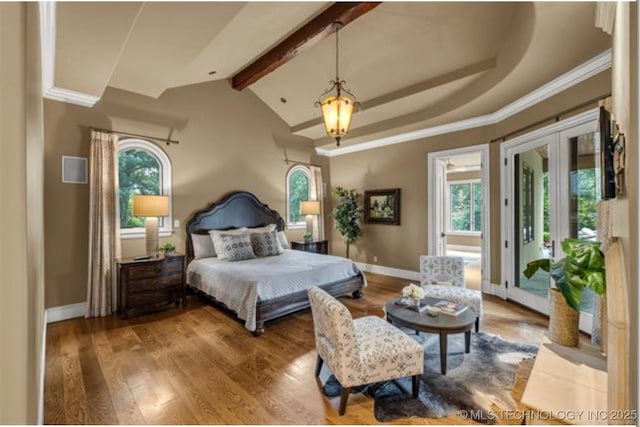 bedroom featuring lofted ceiling with beams, ornamental molding, hardwood / wood-style floors, and access to exterior