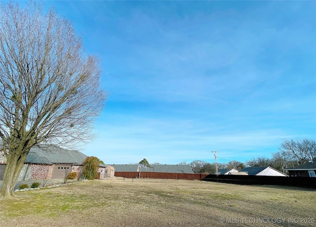 view of yard with a garage