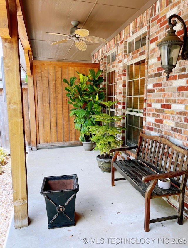 view of patio / terrace featuring ceiling fan