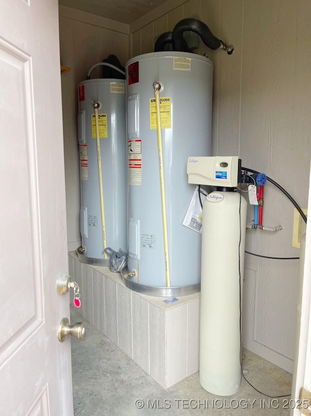 utility room featuring electric water heater