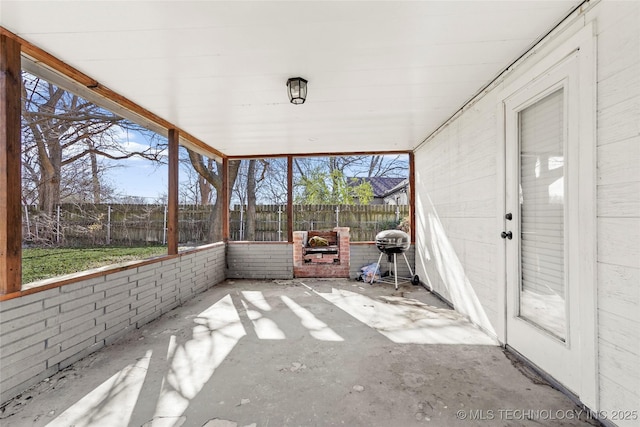 unfurnished sunroom with a healthy amount of sunlight