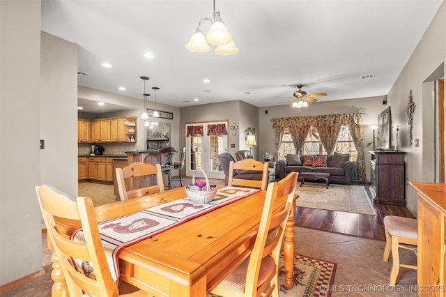 dining room featuring visible vents, plenty of natural light, light tile patterned flooring, and recessed lighting