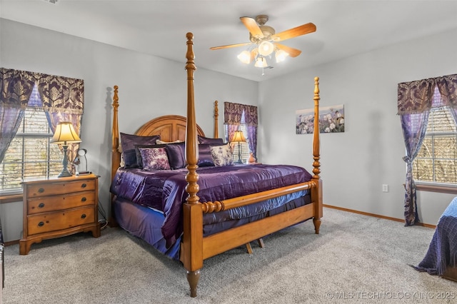 bedroom featuring carpet flooring, a ceiling fan, and baseboards