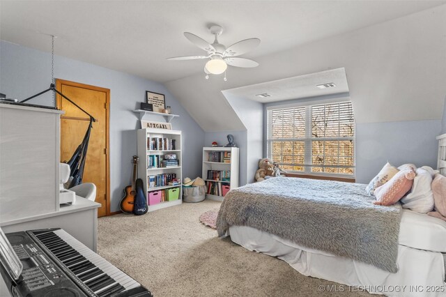 carpeted bedroom featuring lofted ceiling and ceiling fan