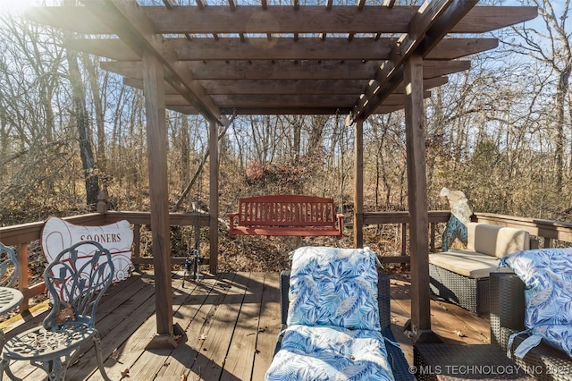 wooden deck featuring a pergola