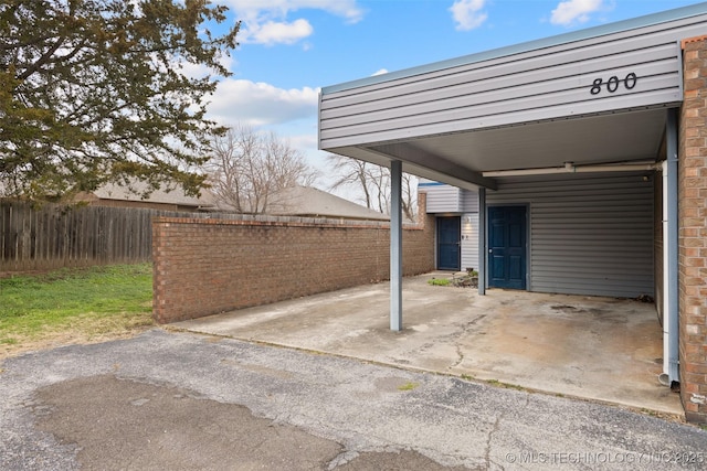 view of patio / terrace with a carport