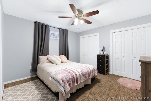 bedroom featuring multiple closets, ceiling fan, and carpet