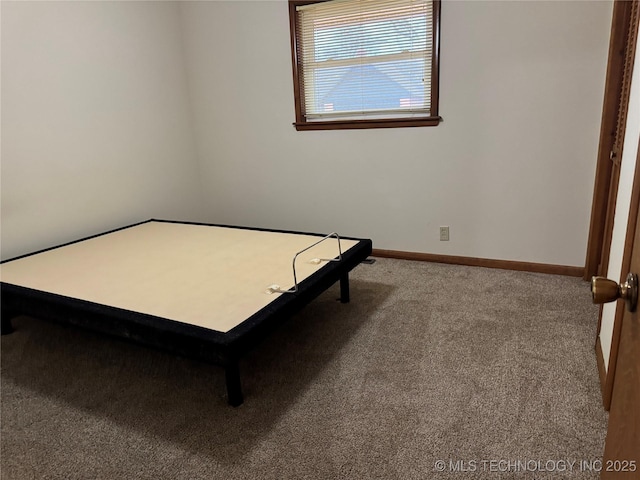 unfurnished bedroom featuring carpet flooring