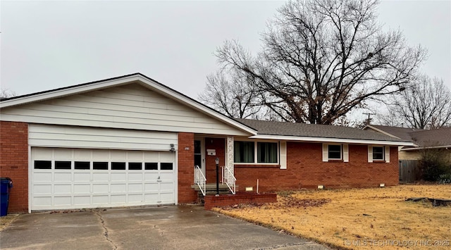 single story home with a garage