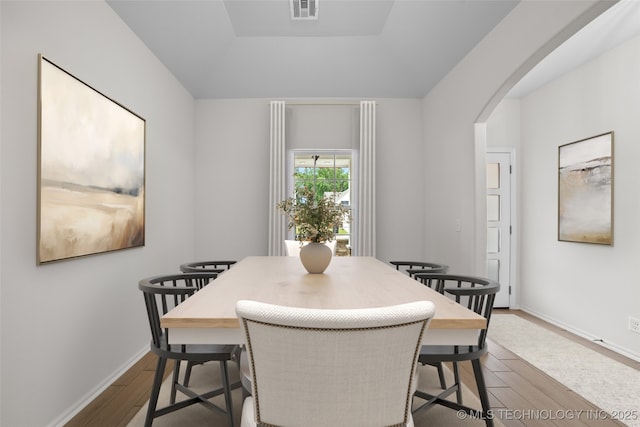 dining space featuring hardwood / wood-style floors