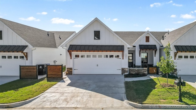 1941 W Huntsville Pl, Broken Arrow, OK 74011 - modern inspired farmhouse with a garage, a front yard, and covered porch