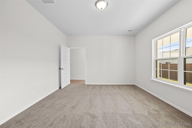 view of carpeted spare room