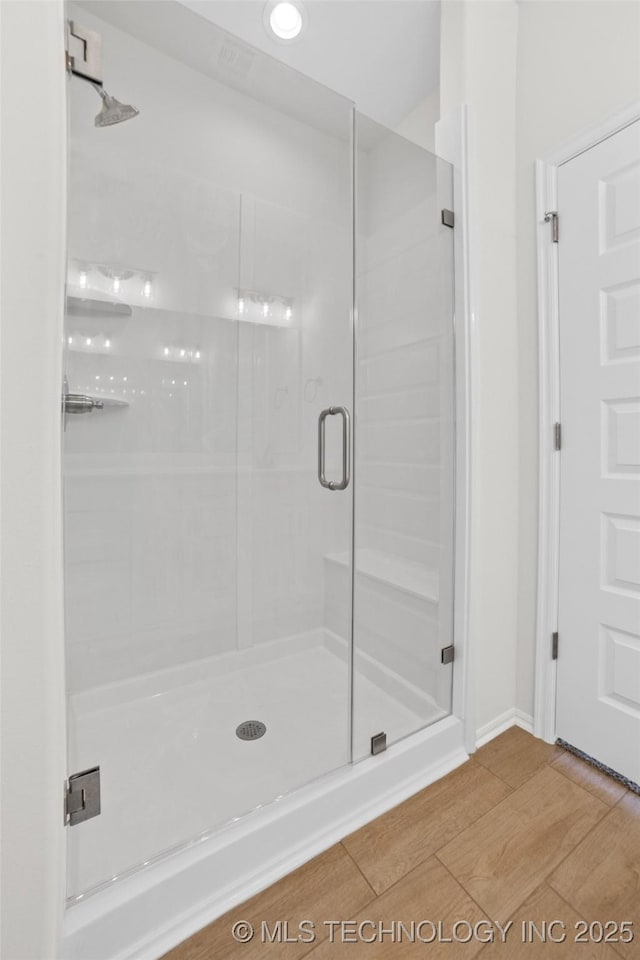 bathroom featuring walk in shower