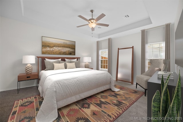1941 W Huntsville Pl, Broken Arrow, OK 74011 - carpeted bedroom featuring a raised ceiling and ceiling fan