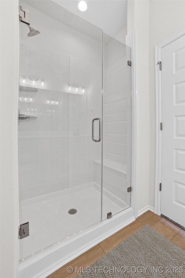 1941 W Huntsville Pl, Broken Arrow, OK 74011 - bathroom featuring a stall shower and wood finished floors