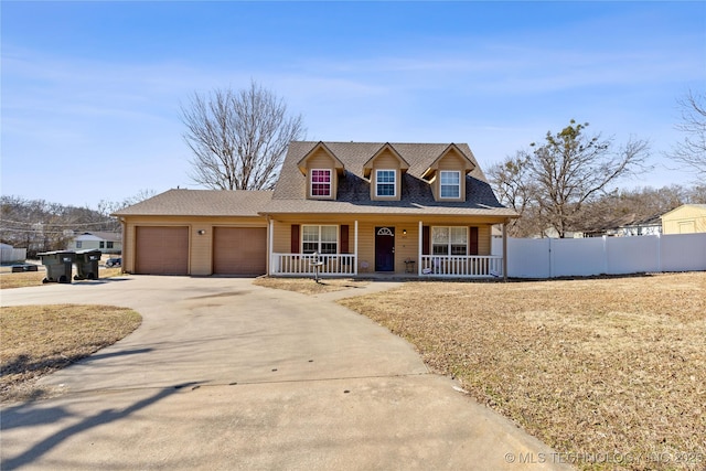 view of front of home featuring a garage and covered porch