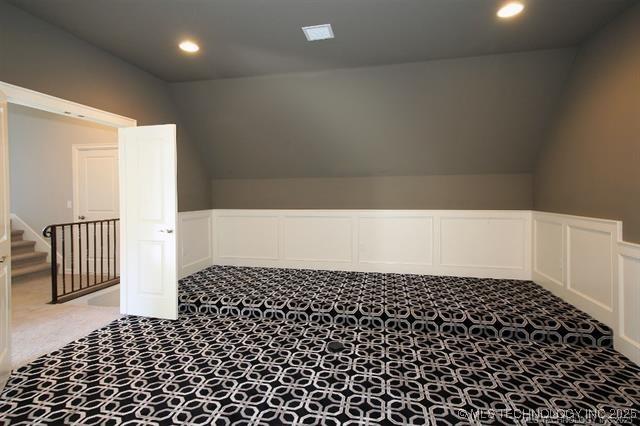 bathroom with a shower with door, vanity, wood-type flooring, and toilet