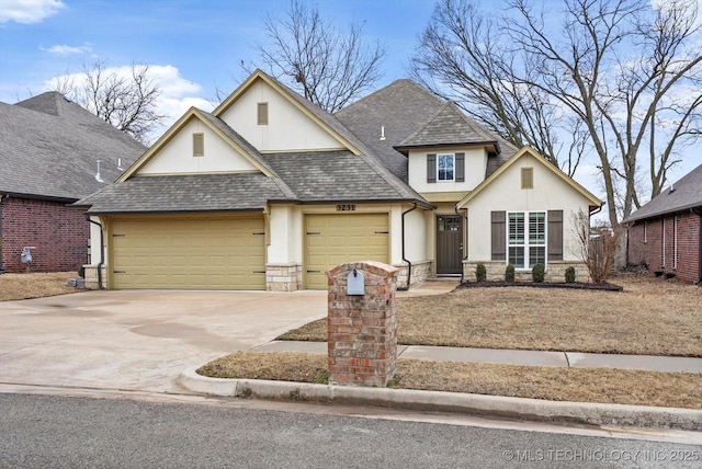 view of front of property with a garage