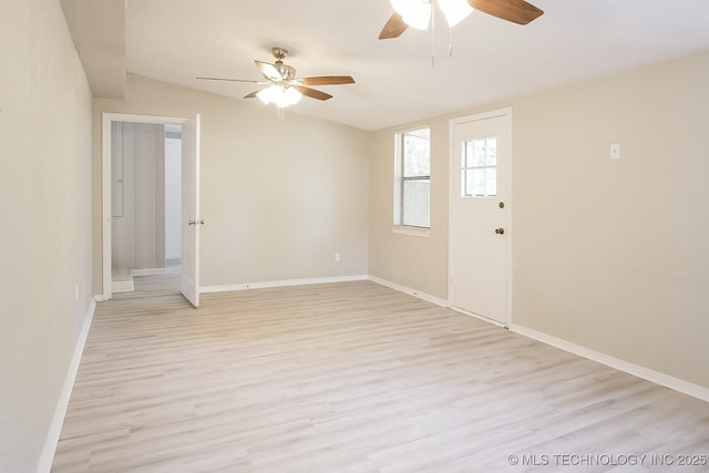 unfurnished room featuring ceiling fan and light wood-type flooring