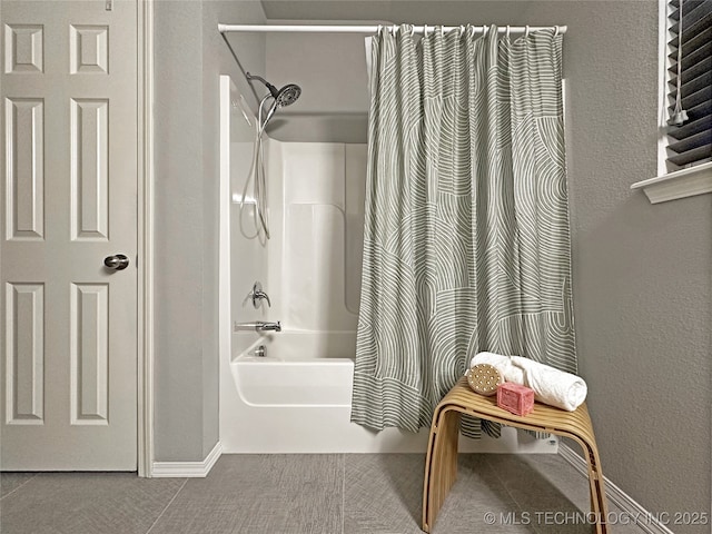 bathroom with shower / bathtub combination with curtain