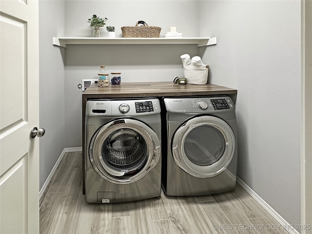 laundry area with washer and dryer